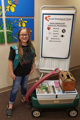A-Girl Scout donates to GSC pic 1.jpg